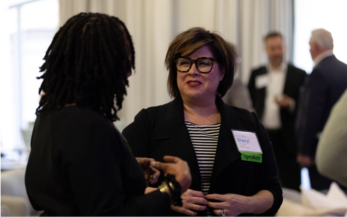 People talking during a networking break